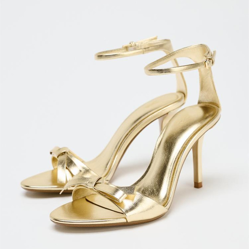Elegant Golden Bow Brand High  - Metallic Heel Sandal のレビューと価格